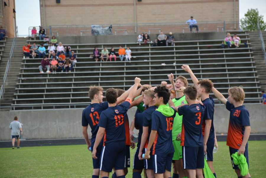 Team huddle at the game vs. Greer