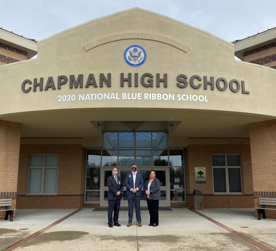 Principal Andrew McMillan (center) stands with administrative team, Ricky Pace (left) and Amy Driggers (right) following the National Blue Ribbon School ceremony on Sept. 24.