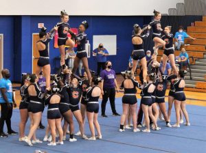 The Chapman competition cheerleading team competes in a competition at Travelers Rest High School last fall. 
