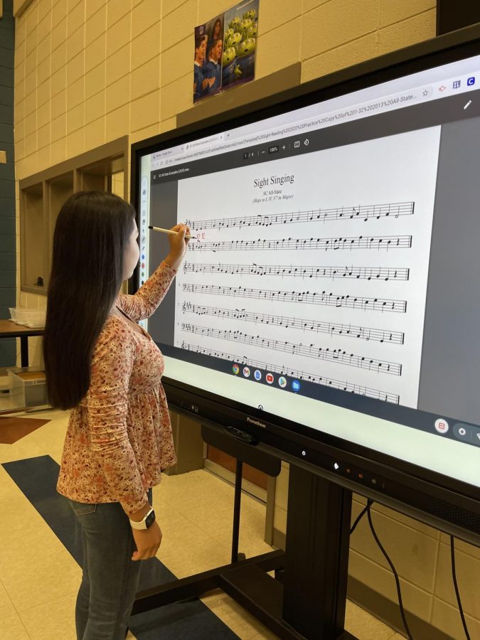 Sophomore Kaia Grace Lawter works on sight reading during choralation.  