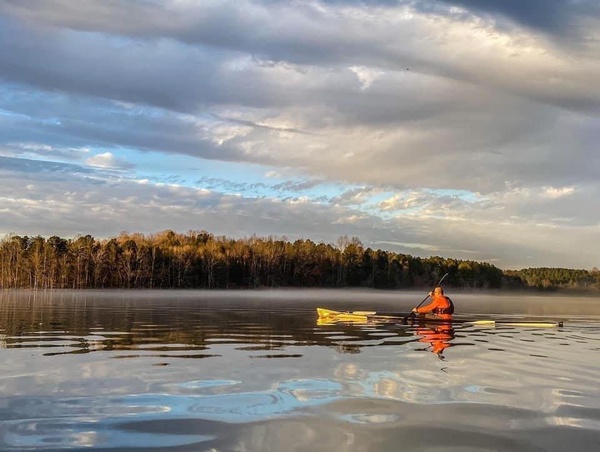 Fred Brown paddles along Lake Cooley during a practice session.