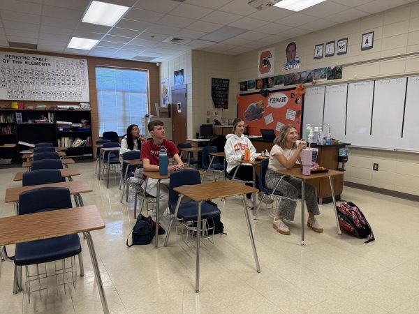 Students in AP Biology listen to teacher Ryan Mandlove. 