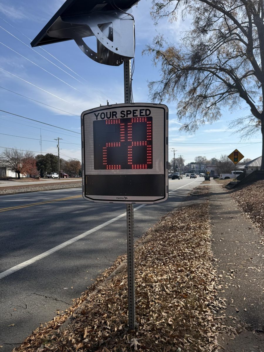 A speed sign in downtown Inman clocks a car at 28 mph. The signs have been installed to encourage drivers to slow down.