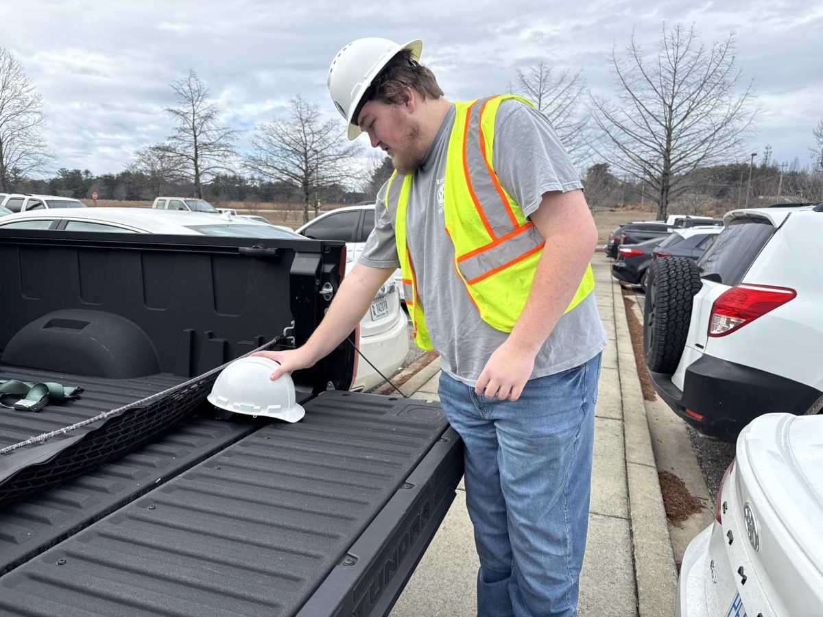 Junior Declan Shensky gathers equipment for his class at Master Skills Center. 