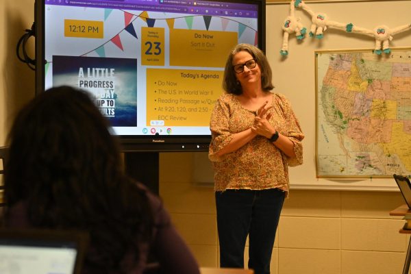 Social studies teacher Fara Stewart teaches a class on World War II. Stewart will retire this year after 28 years in education.